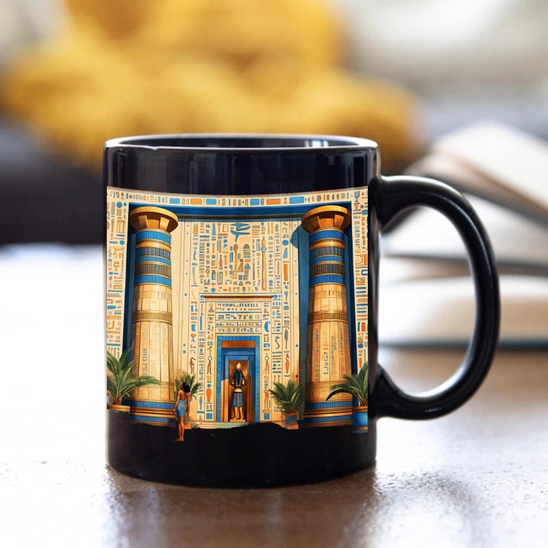 A black Egyptian temple designed ceramic cup with hieroglyphics and columns is suitable for drinking coffee, tea, or water at ho