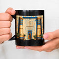 A black Egyptian temple designed ceramic cup with hieroglyphics and columns is suitable for drinking coffee, tea, or water at ho