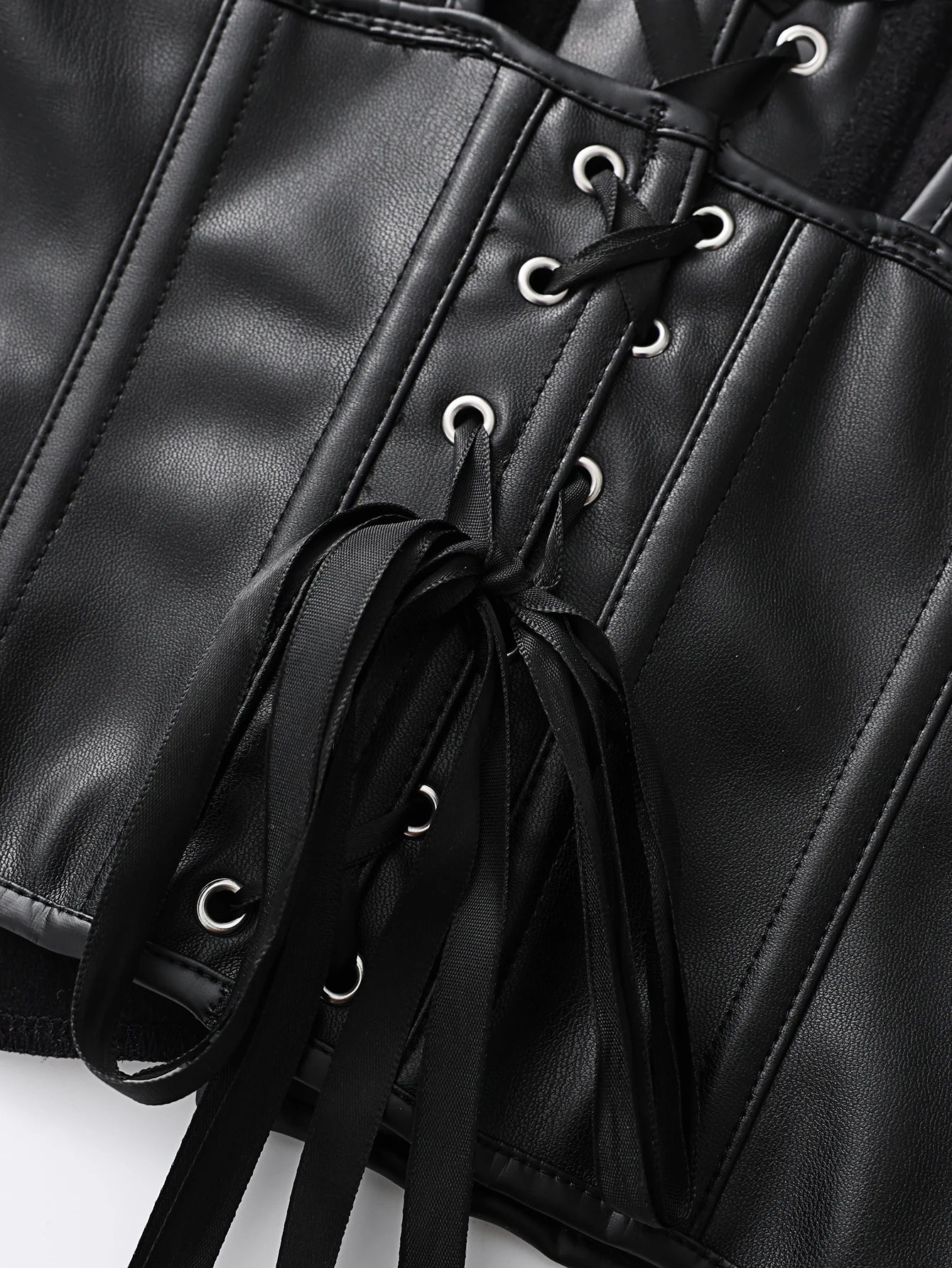 Punk style genuine leather blazer with wide shoulder straps and front ties for waist cinching and shaping. Short, tight corset.